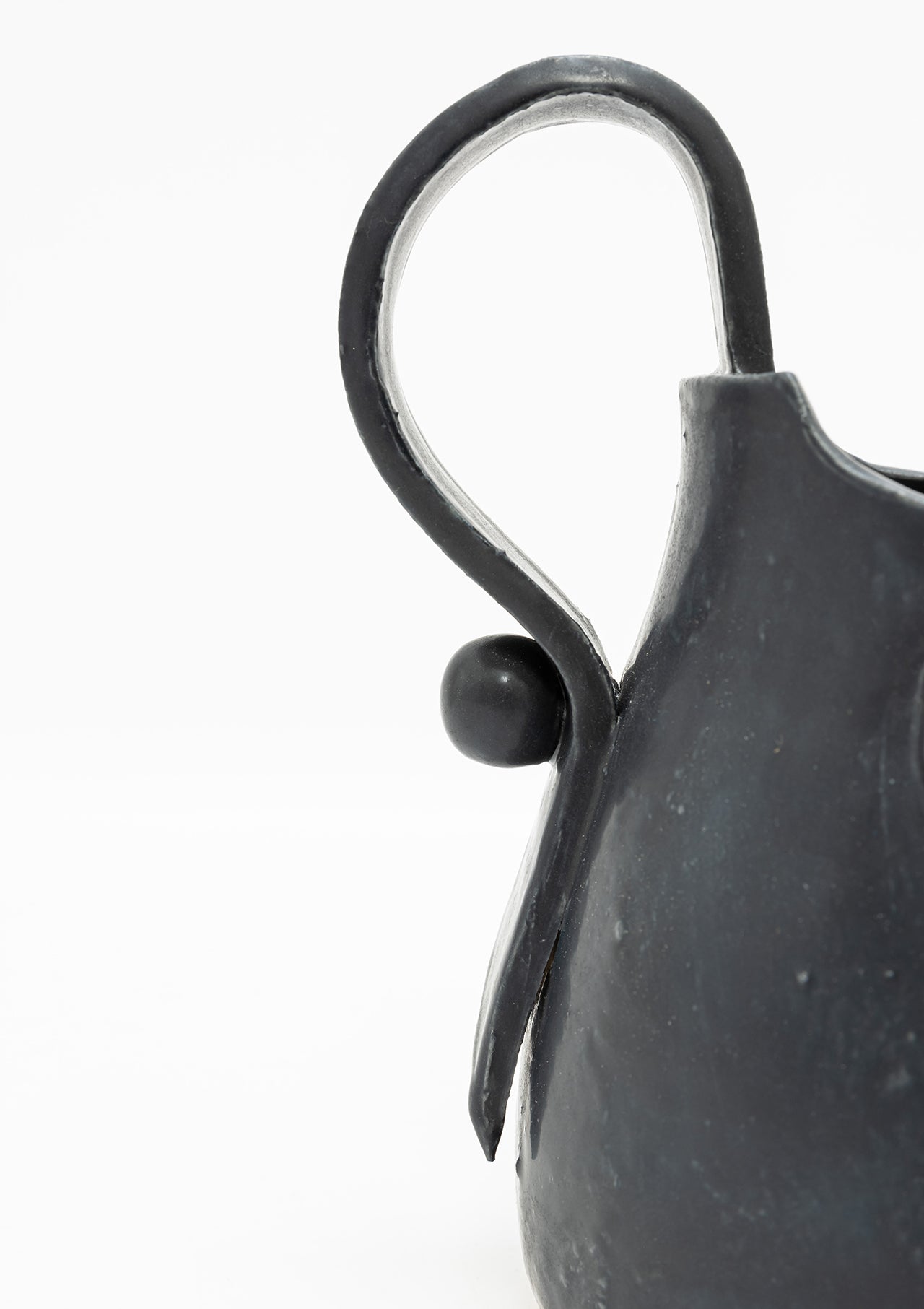 Lion Shell Handmade Pitcher | Soot